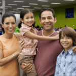 hispanic family smiling - Traveling while undocumented
